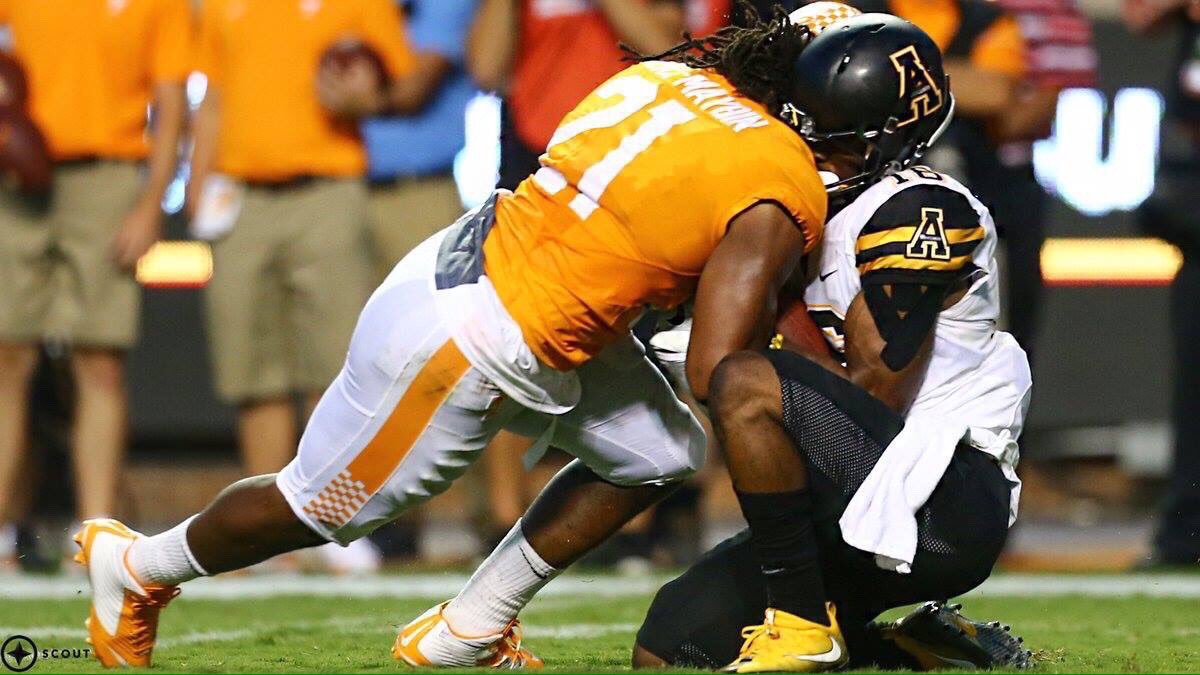 TeranJSports's tweet photo. The picture on the left was called targeting. The one on the right was not. Nice job, @NCAA https://t.co/iGYxRD6jrH