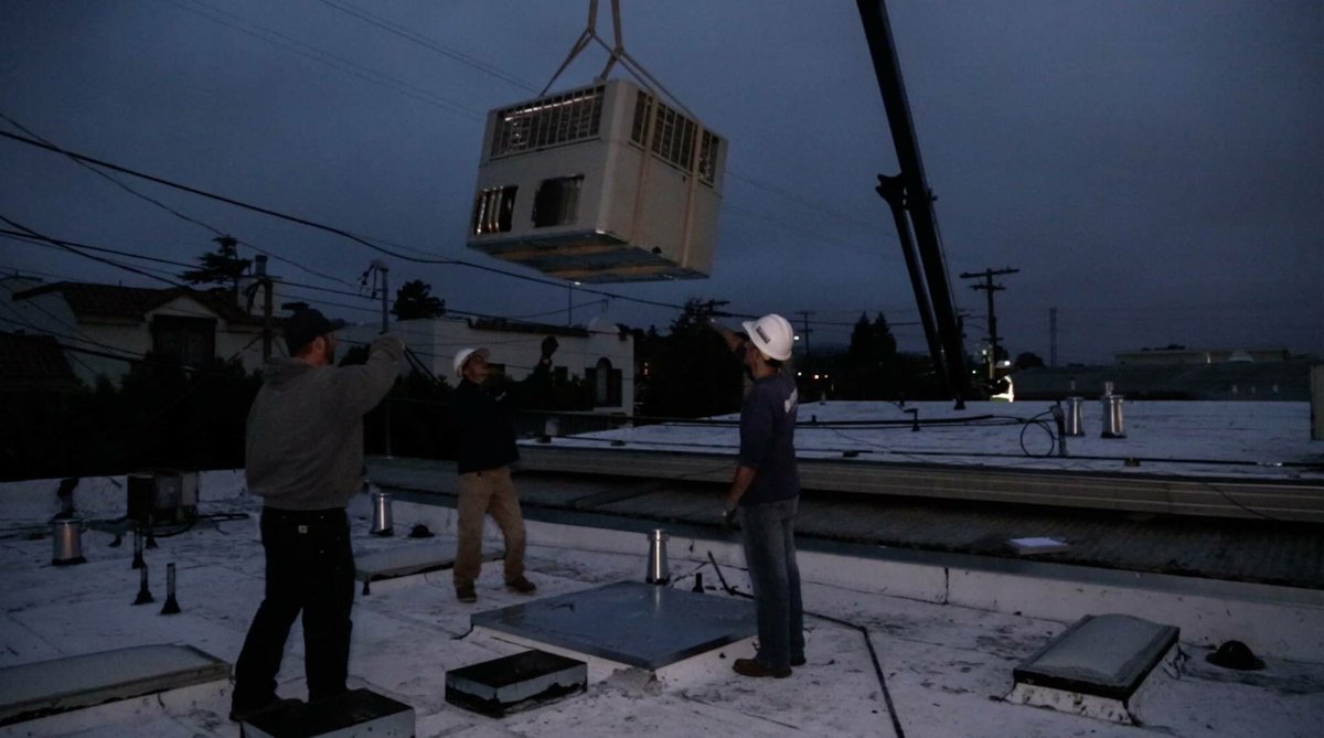 Al &amp; his crew welcoming the new unit via crane.