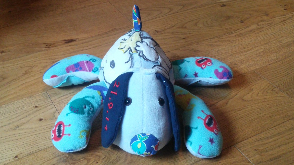 miamama2015's tweet photo. Keepsake dog made from first onesies #miamama #memorykeepsakes #keepsakesmadefromclothes https://t.co/aSQ3i6ETSu