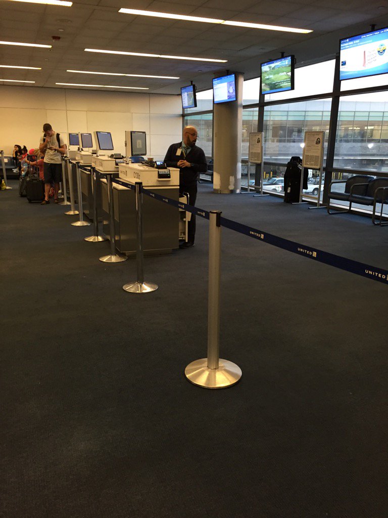 dckuntry's tweet photo. Delayed flight with #united and they have seats close to gates roped off. Why? https://t.co/2YvtbnaMkq