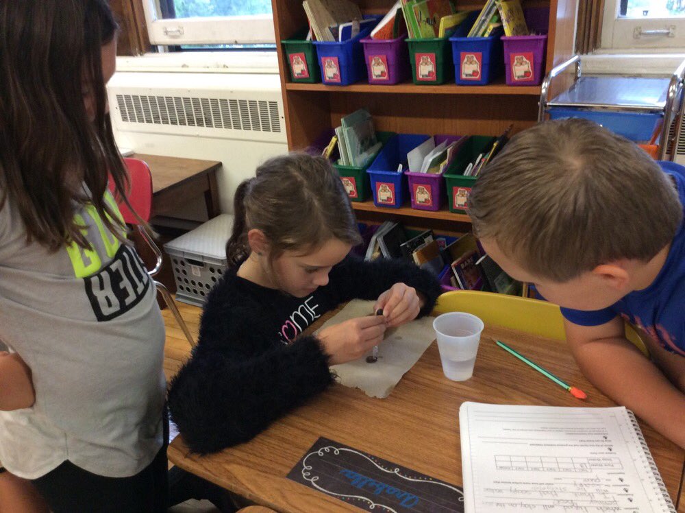 stacyras77's tweet photo. @JeffersonSTEM fourth graders doing an experiment using the scientific method. How many drops fit on a penny? https://t.co/8L5fO6MsMo