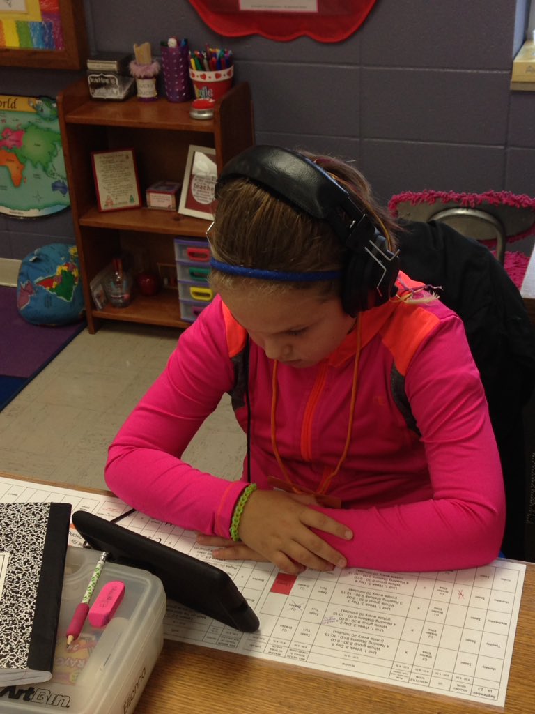steveharman62's tweet photo. Elli Hoefert enjoys listening to an online reading book in Mrs Boekhout's room @CentralLyon #21st century learning https://t.co/MqTVjgTyMX
