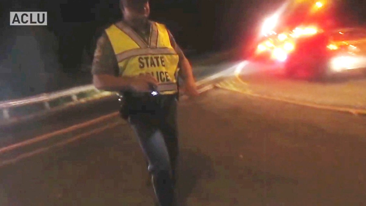 democracynow's tweet photo. Connecticut State Troopers Unwittingly Film Themselves Fabricating Charges Against Protester https://t.co/luZBjEoIoO https://t.co/UEgYl6kkgA