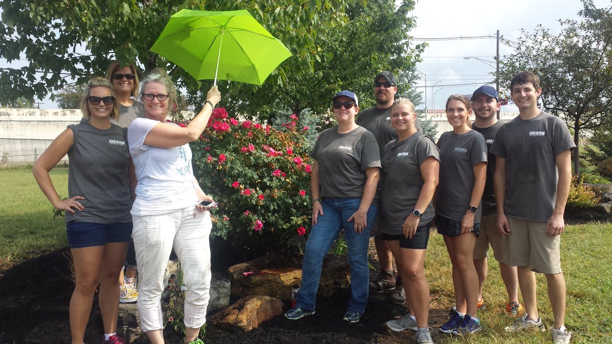 A little rain didn't stop these wonderful volunteers! #ThrowbackThursday