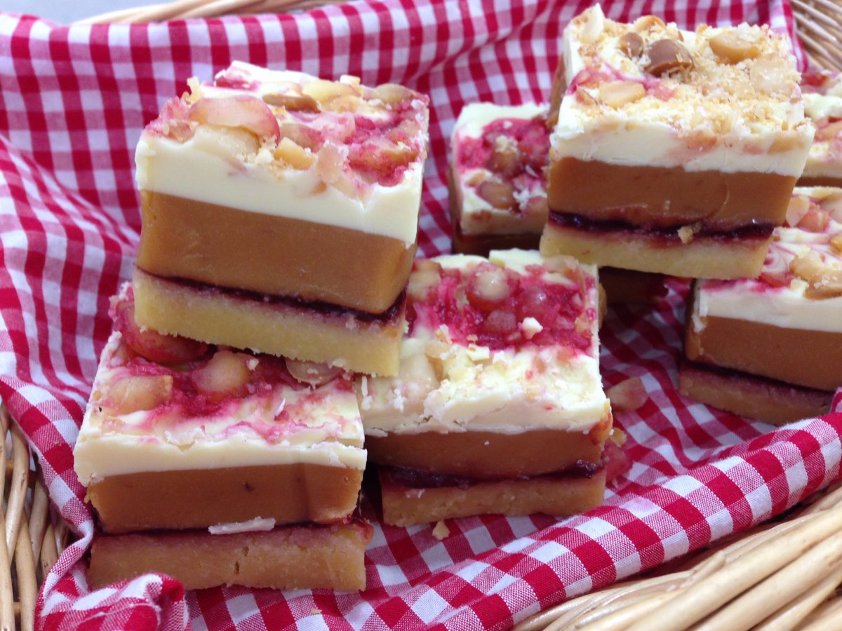 naturallybread's tweet photo. ICYMI these beauties are available tomorrow! White chocolate, caramel, fresh raspberry layer, toasted macadamia nuts… #drool #devonfood https://t.co/2K9S21cj2v