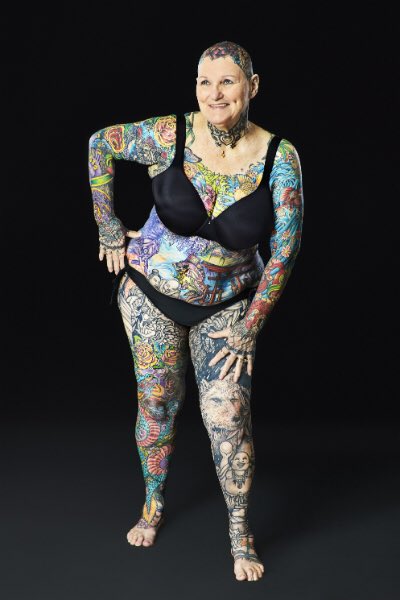 SeriousStrange's tweet photo. Charlotte Gutenberg, 67, holds the World Record for the most tattooed senior citizen. 91.5% of her body is covered in tattoos. https://t.co/q7vnohvtlh