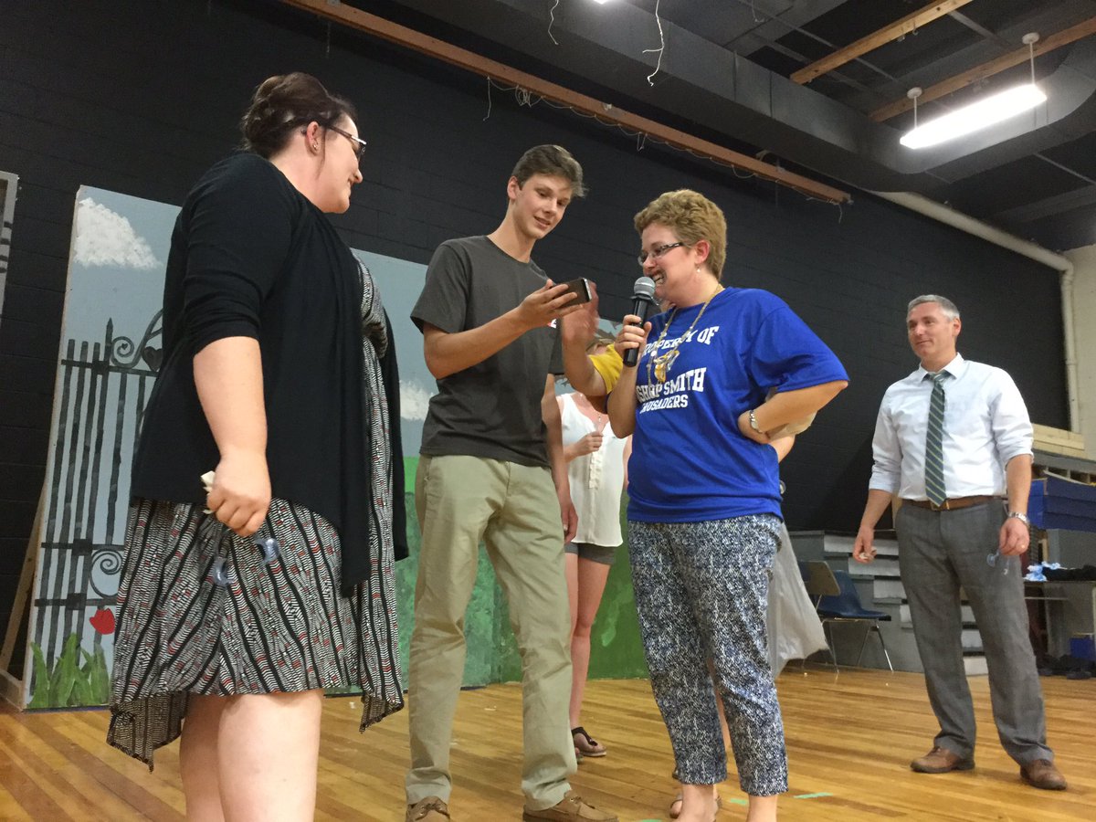 BishopSmithCH's tweet photo. Ms. Laabs and Brandon leading the new BSCH staff in a game. Glad they are smiling. #InitiationTime https://t.co/9MYa64qIis