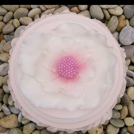 Our latest #wedding #cake - Delicate flower ruffles, intricate lace &amp; topped with a beautiful flower.