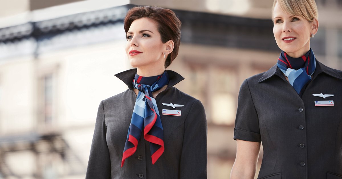 AmericanAir's tweet photo. Très Chic! Stylish &amp; sophisticated, our female Flight Attendants are now boarding &amp; working their new look. #AATeam https://t.co/kKltuX748K