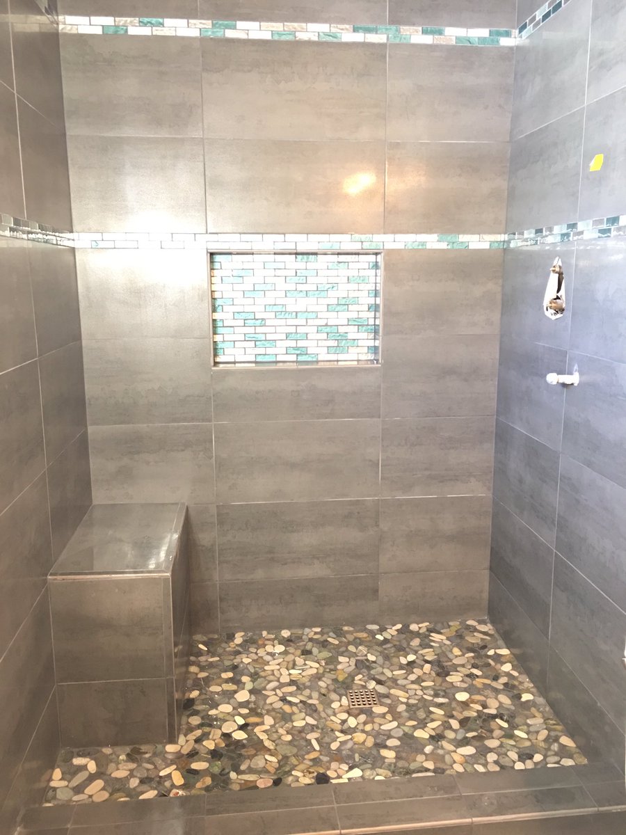 customtile's tweet image. Tub conversion into a walk in tiled shower stall.