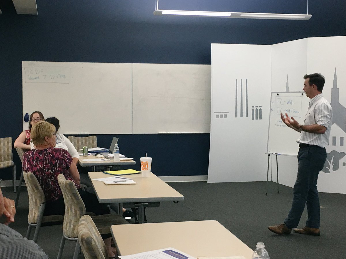 Tech_Collective's tweet photo. TC's @ianqmcgarty is helping @techforceri & @Launch_Code participants find the "hook" for their elevator pitches! #LaunchCodeRI https://t.co/zqAwq9mjvI