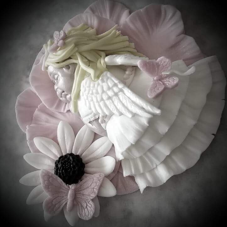 timciska's tweet photo. A precious Angel cake topper...100% fondant https://t.co/GWX5R42Gl3
