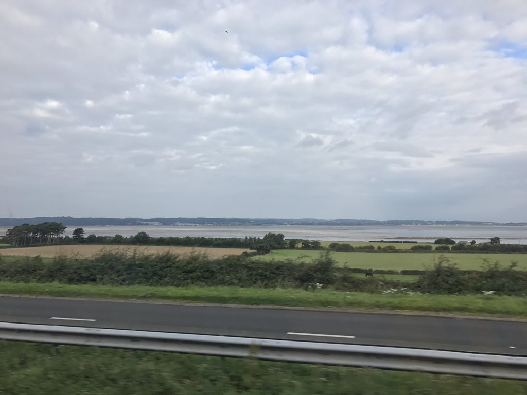 EllardLucy's tweet photo. View of Anglesey from the #secondcoach @AnnWilliams6 @SHSB1000Lives @Bangorstudents @SHSBangor https://t.co/UojQjOr8g4