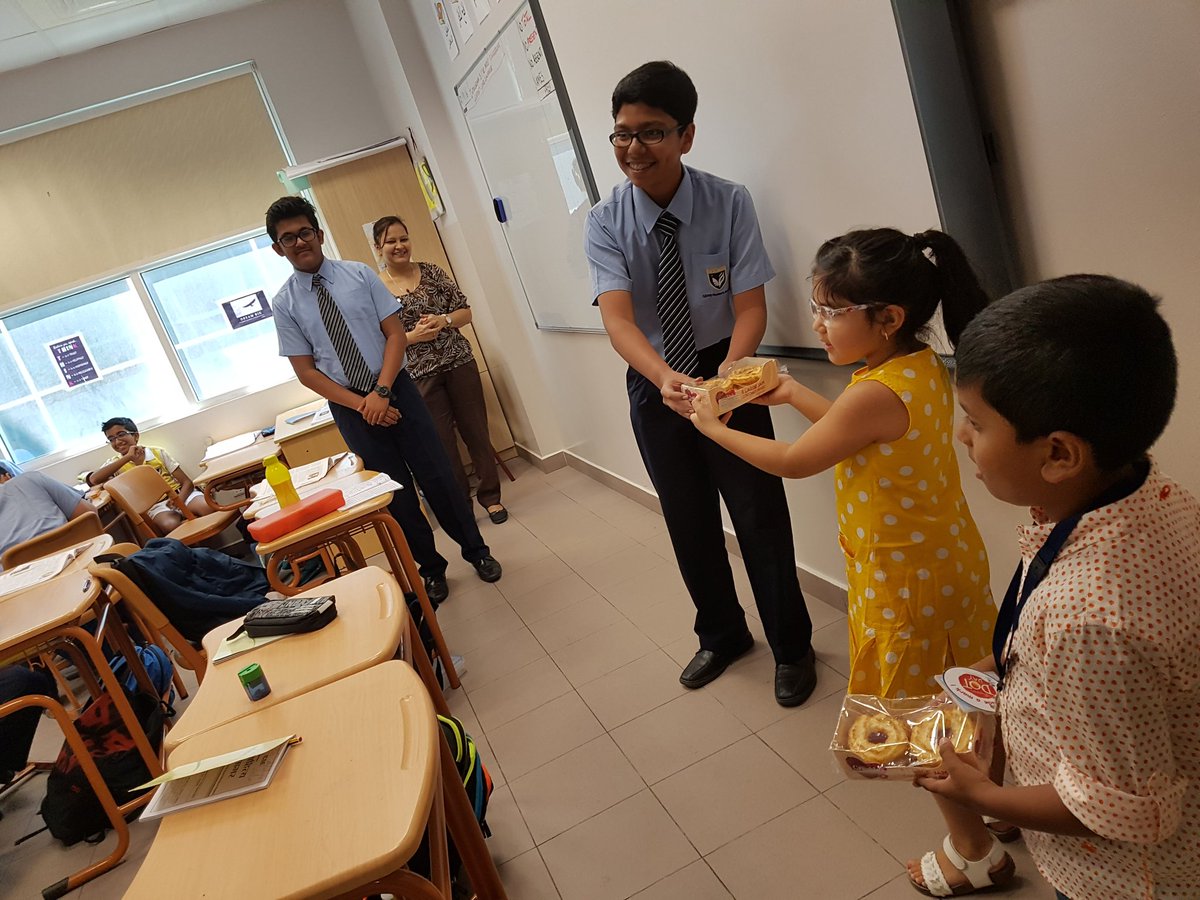 26Dakshamehta's tweet photo. KG babies hand over goodie boxes to the winners of the #DigiDot twitter competition! #DotDay @KNargish @DxbModern https://t.co/7HODYCy1bn