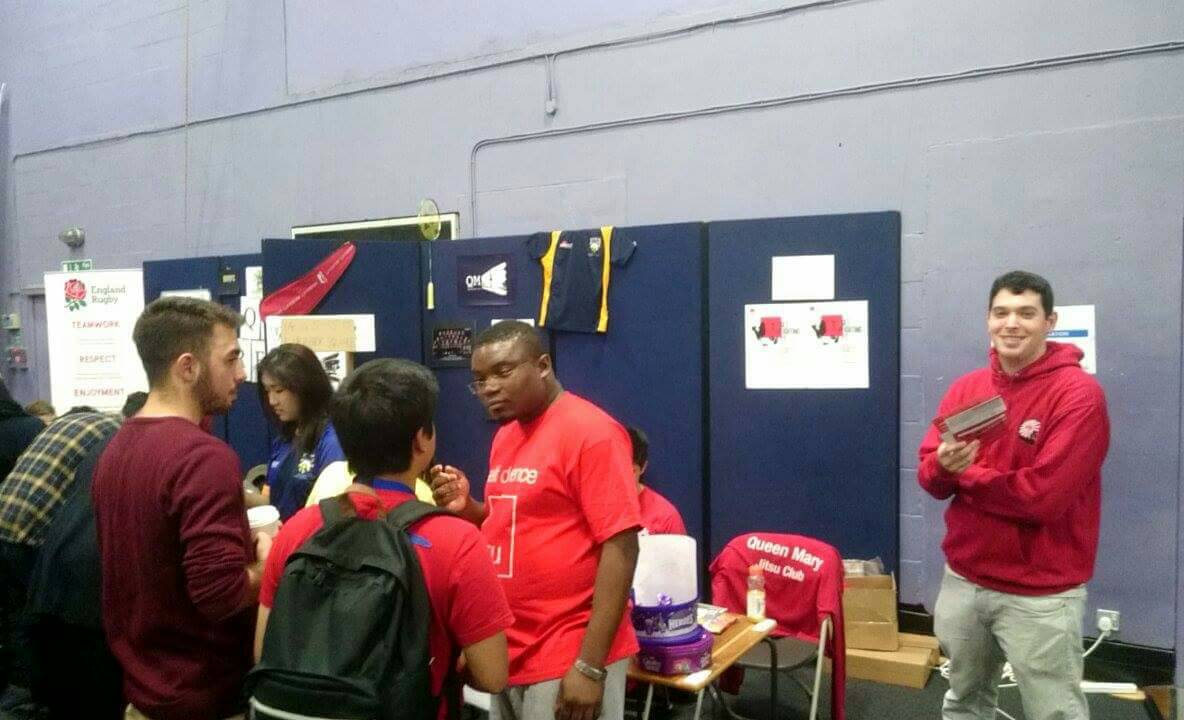 QMJiuJitsu's tweet photo. Elikem working the charm (probably bribing a lot with the sweets too) can someone come to speak with Gideon? @QMSU @QMSU_Sport @QMUL https://t.co/QSTvdMdO2d