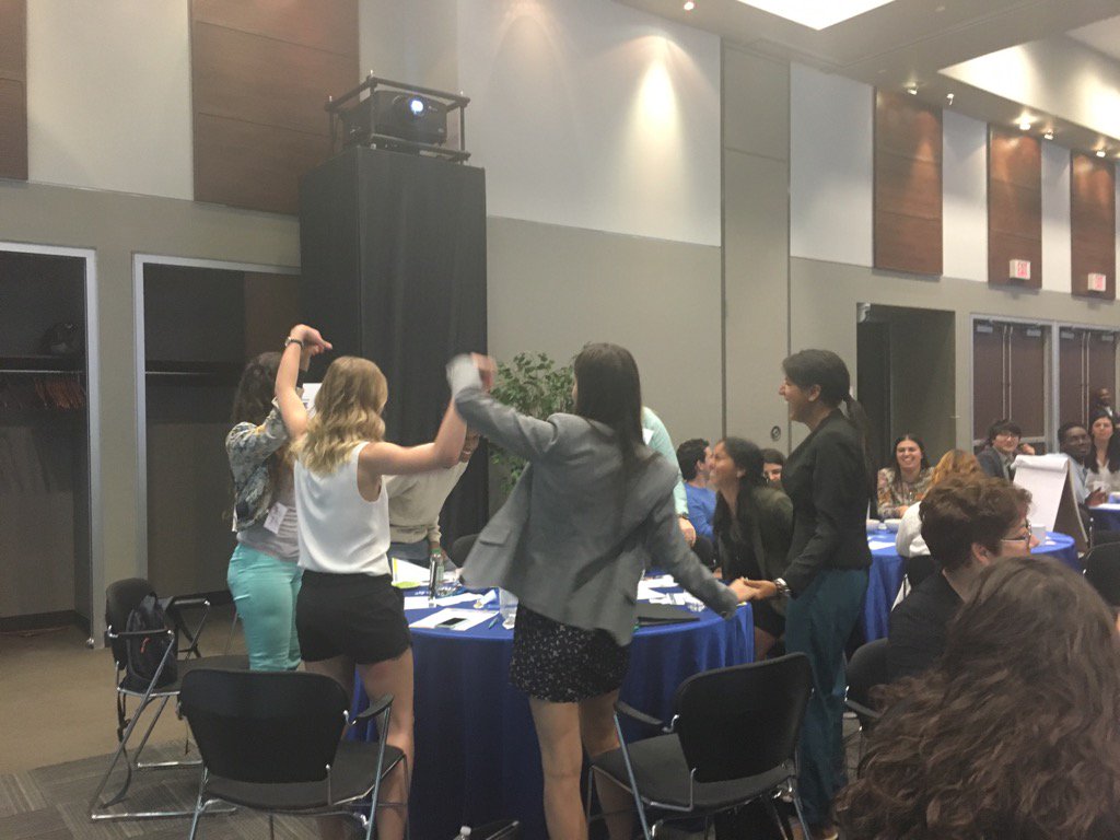 ShaeZday's tweet photo. Group stretch is necessary for #engagement #YouthImpactSummit #breakgoals https://t.co/nLofITTVbe
