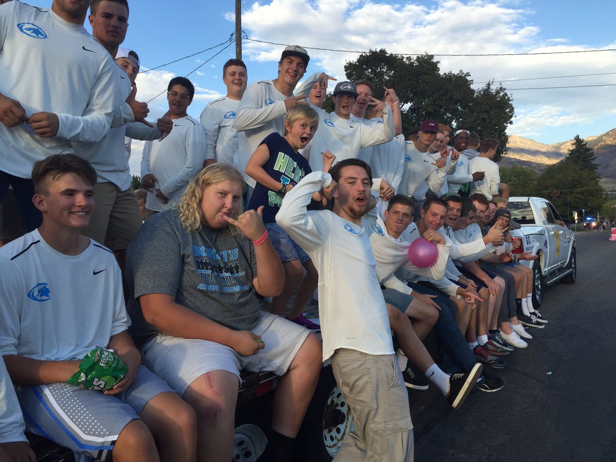 Football at the homecoming parade