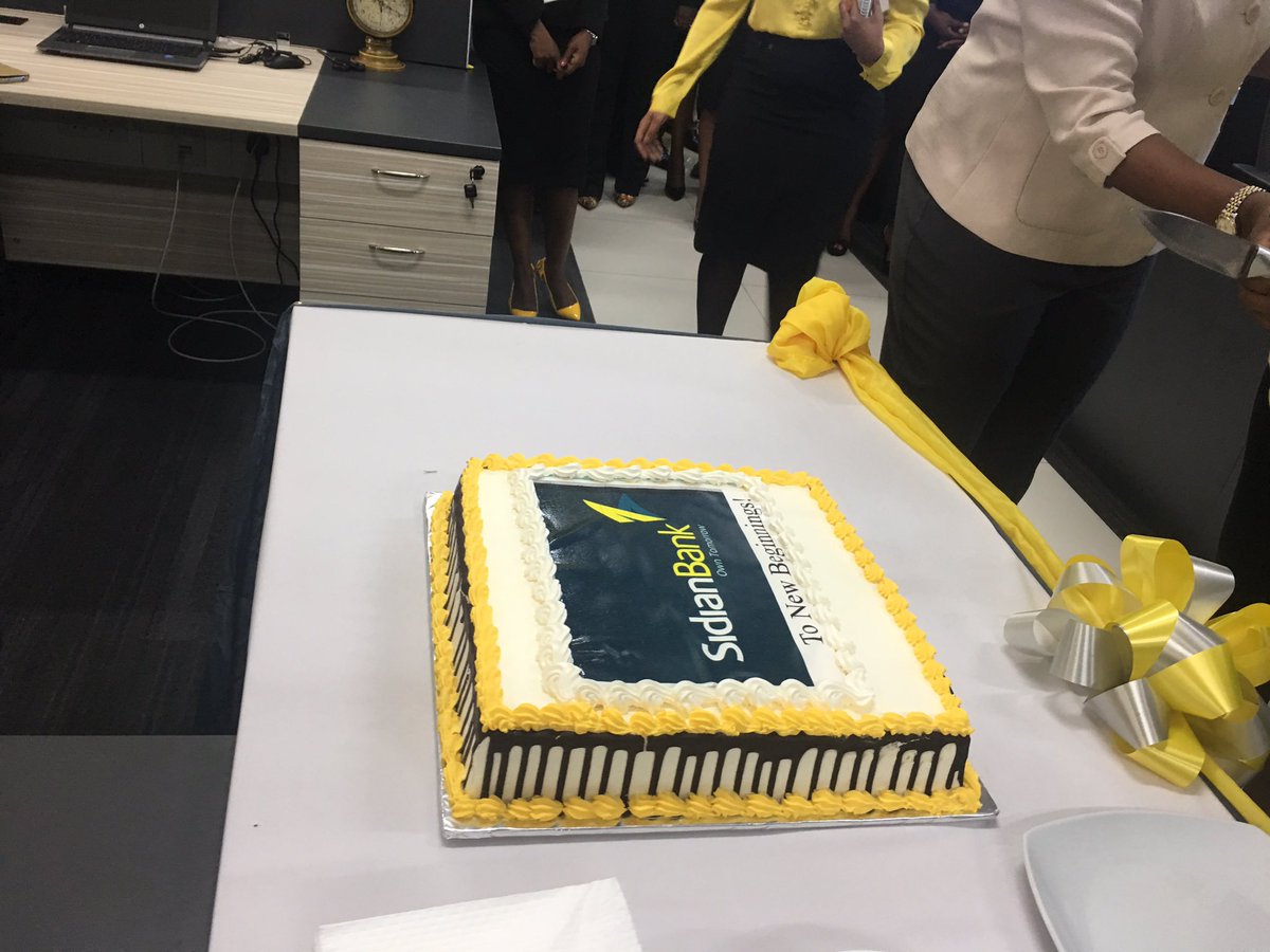 SidianBank's tweet photo. #SidianBank Board members cut the cake to celebrate the moment https://t.co/mZVyGaGkEh