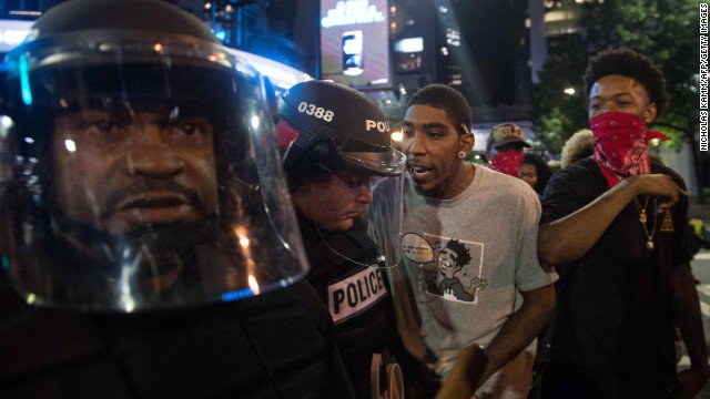 cnnbrk's tweet photo. North Carolina governor declares state of emergency in Charlotte over violent protests, will send in National Guard. https://t.co/jMbGYKJeE7 https://t.co/SJCUMWpHza