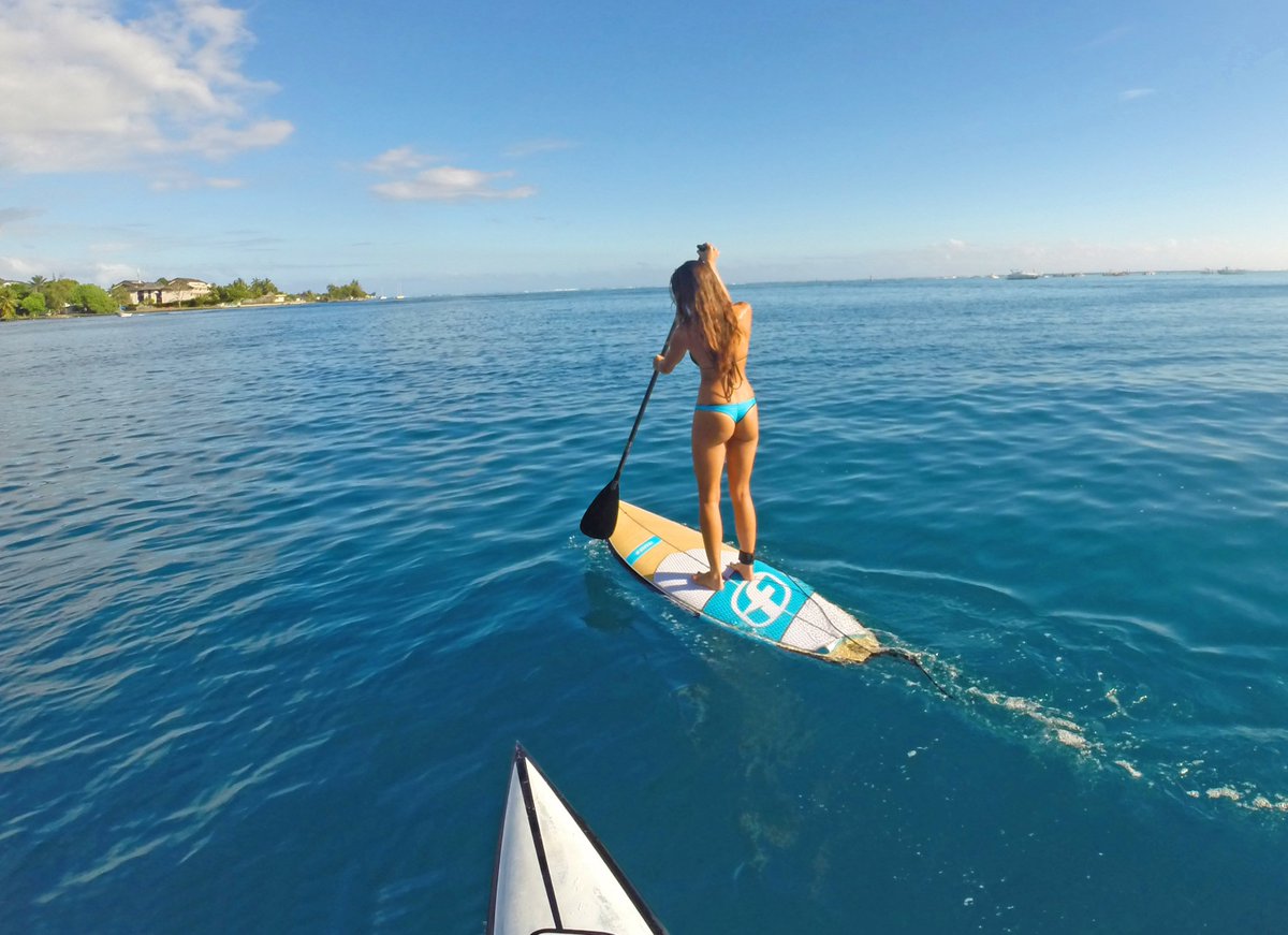SurfingTravels's tweet photo. When your friend paddles faster than you on a smaller board...  #shesonfire #supgirls #surfbikini https://t.co/agVAauggTJ