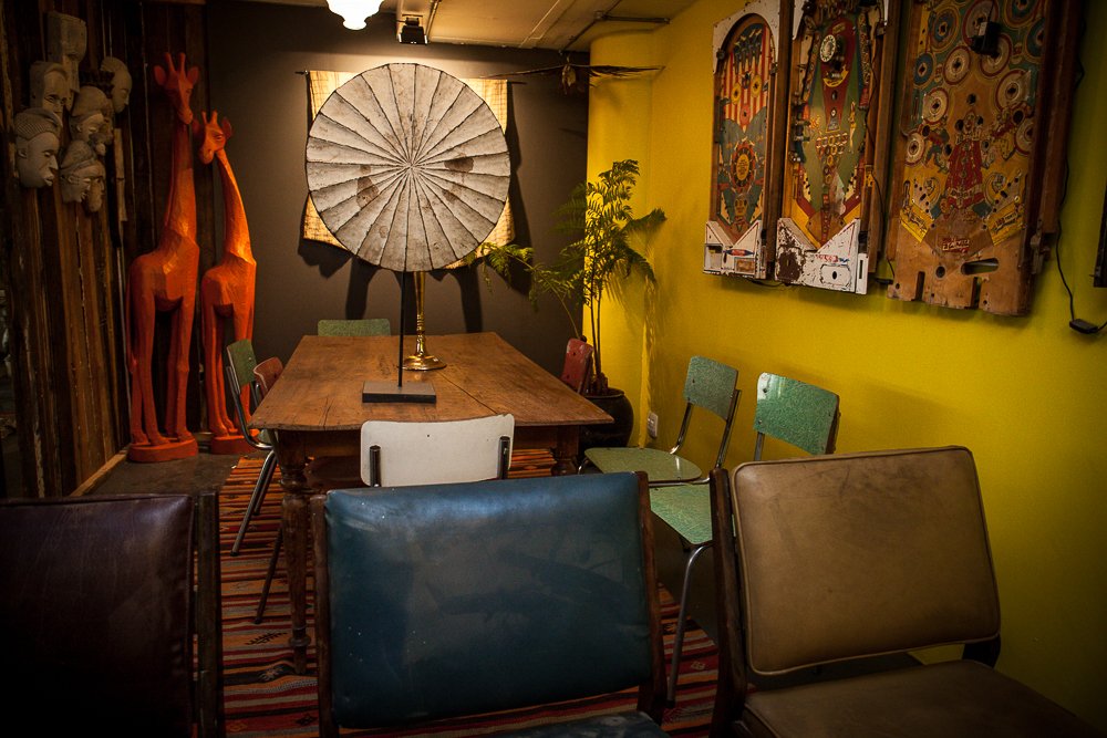 milkbar_sa's tweet photo. Hand-carved orange giraffes hiding out in a cosy corner at our #rosebank store #getafrican #milkbarsa https://t.co/xJ2UCrCz4s