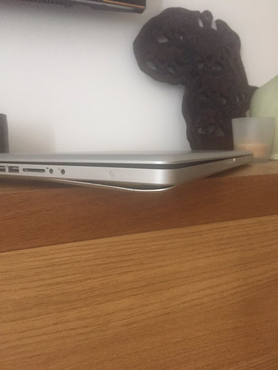 Faithlessshow's tweet photo. Can someone explane why my MacBook Pro has expanded and is now damaged?? @Apple not what I need running my business on it. https://t.co/WQOAZrdfBx