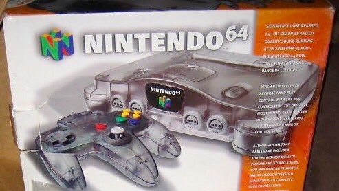 nintencollect's tweet photo. In keeping w/ #WeeklyPlanetPodWeek we begin this #NinThursday64 w/ the Australian-exclusive box for the rare transparent charcoal color #n64 https://t.co/I5XYfqj8ry