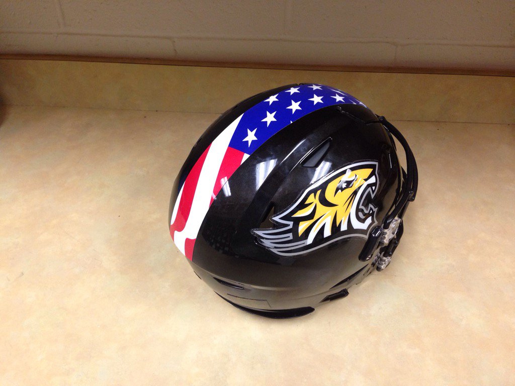 Towson_FB's tweet photo. The Tigers will honor the First Responders by wearing the Stars and Stripes on their helmets tonight. #NotSoFlash https://t.co/GGzTvVWHSC