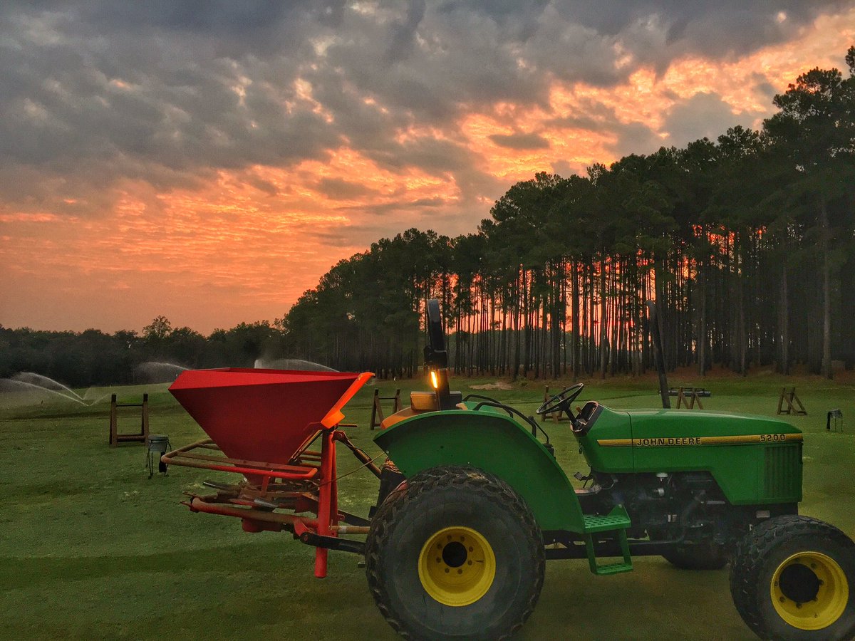 TobaccoRoadGolf's tweet photo. Traffic jam with @morgan_theroad catching the sunrise this morning. @JohnDeere #deeresighting #pga365 https://t.co/9hXaDO1bYc