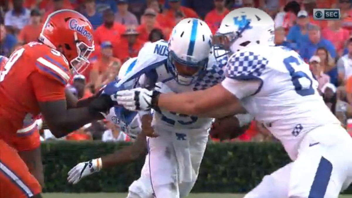 Cover3Podcast's tweet photo. WATCH: Kentucky lineman strips his own quarterback of the ball https://t.co/0Is1ffH7LC https://t.co/e61KVpHBWf