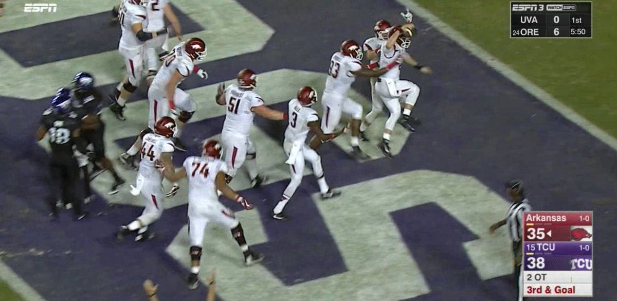 SECNetwork's tweet photo. WOOO PIG SOOIE!!!

Austin Allen on the keeper and Arkansas upsets No. 15 TCU 41-38 in Double OT. #ARKvsTCU https://t.co/Y2YuySoIBo