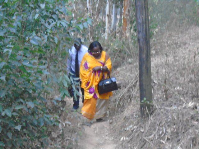 ASSHU2020's tweet photo. The Chairperson Leading the team to the top facing Lake Bunyonyi https://t.co/YU90OvhHW3