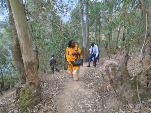 ASSHU2020's tweet photo. The Chairperson Leading the team to the top facing Lake Bunyonyi https://t.co/YU90OvhHW3