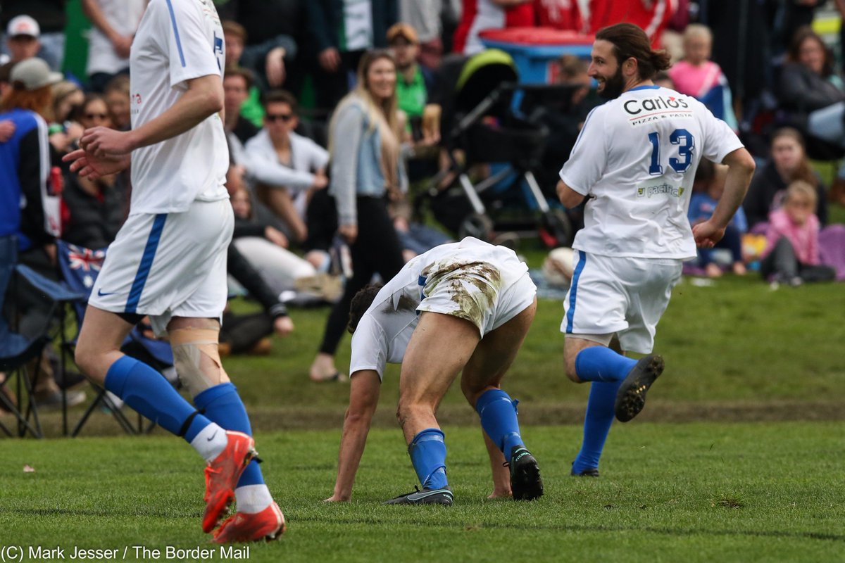 MarkJesser's tweet photo. Awkward mud position for Myrtleford's Brenton Cook today versus Albury City in @AlbWodFA grand final @bordermail https://t.co/uOsKDn9KBR
