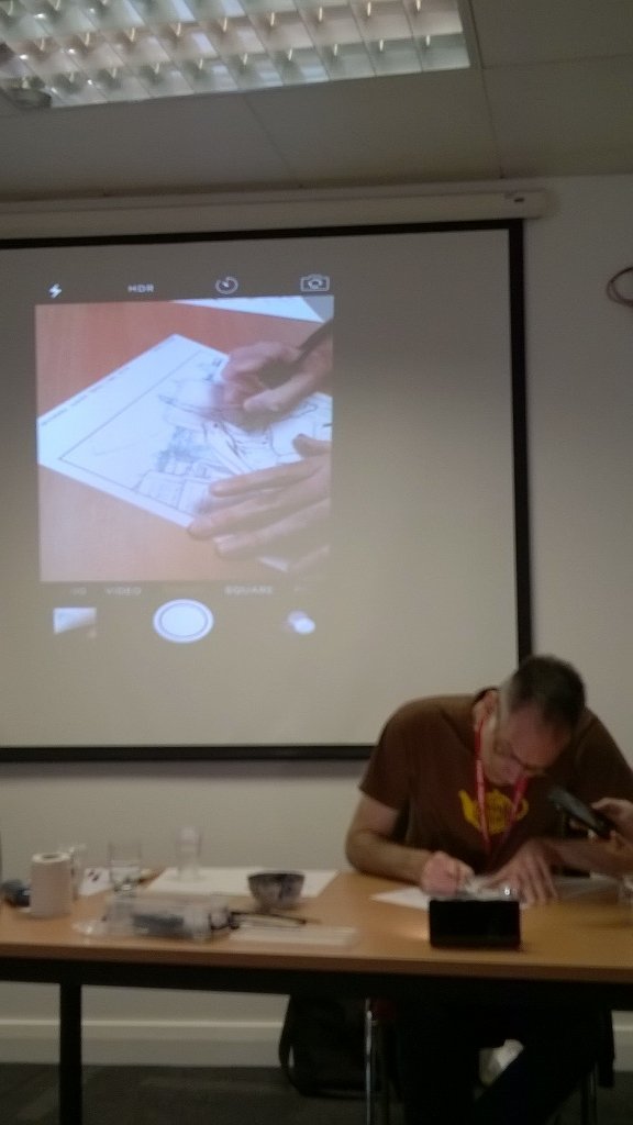 TMCillustration's tweet photo. Cam Smith inking tutorial underway at #comicsuncovered https://t.co/tqznKAzmPz