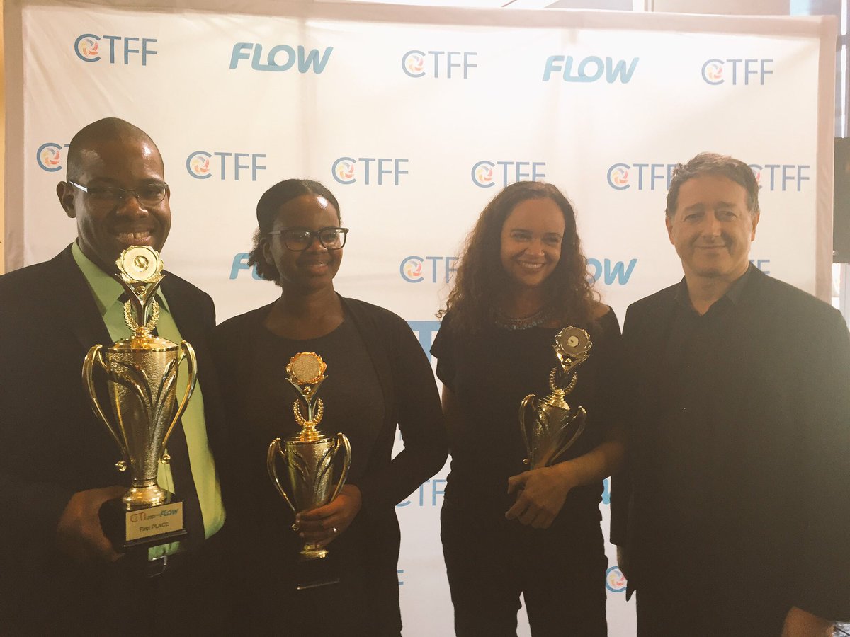 CaribbeanTales_'s tweet photo. And the judges choice winners! @angelking144 @kafikareem and @onetrini with Flow CEO John Reid! #CTIncubator2016 https://t.co/N2MCDjduoi
