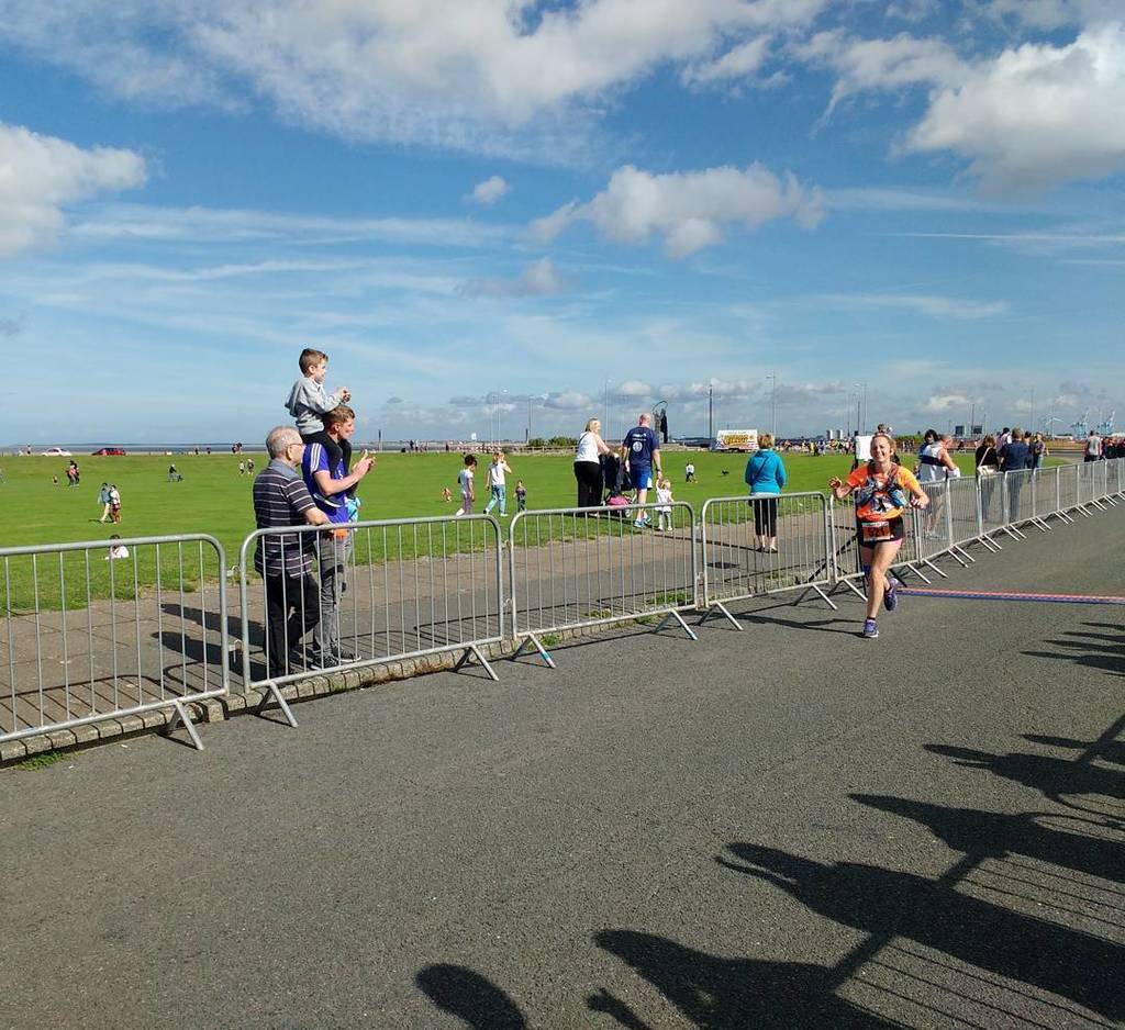 DouglasKuhrt's tweet photo. Helen finishing strong at the Wirral Half. #running #ukrunchat #wirralhalfmarathon #halfma… https://t.co/FhROwiupw6 https://t.co/hUZOvC5Xiv