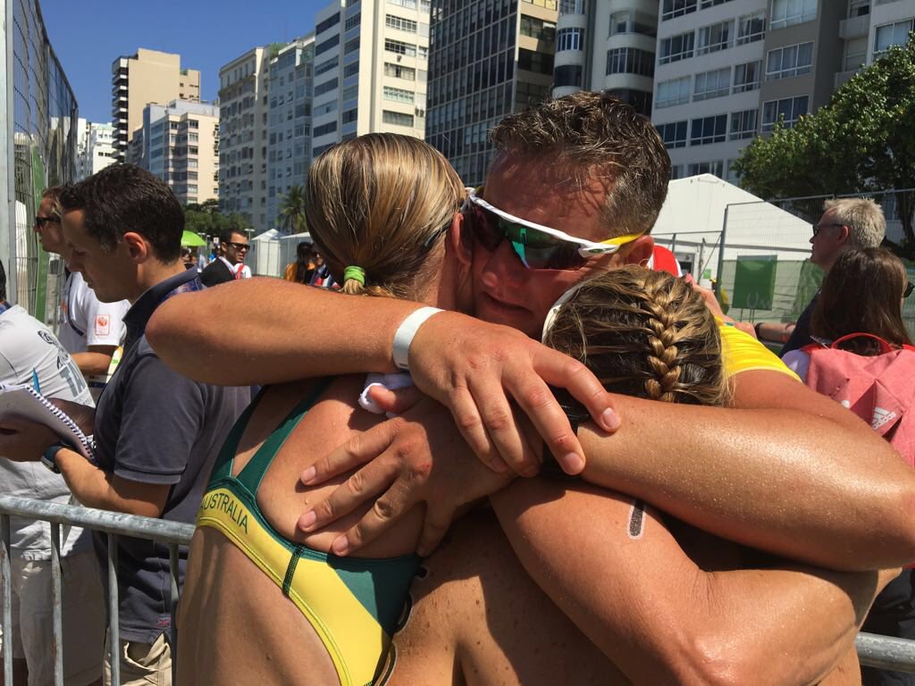 GOLD MEDAL! <a href="/katiek23/">Katie Kelly OAM PLY (she/her) 🌈</a> &amp; <a href="/GoMichellie/">Michellie Jones</a> embrace coach <a href="/BaconCorey/">Corey Bacon</a> after winning the #Rio2016 women's PT5 triathlon!