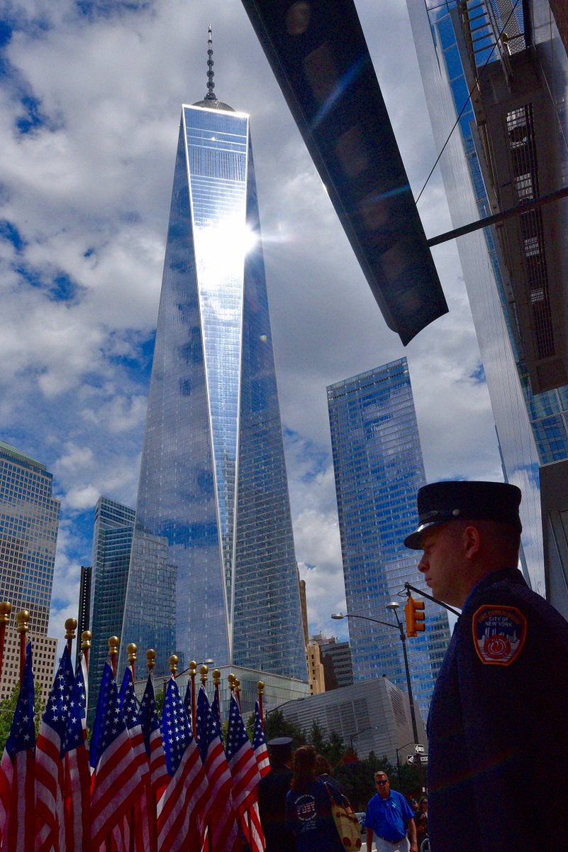 FDNY's tweet image. #FDNY Honor Guard stands outside the Tribute Wall at #Engine10 &amp;amp; #Ladder10 in Lower Manhattan #NeverForget
