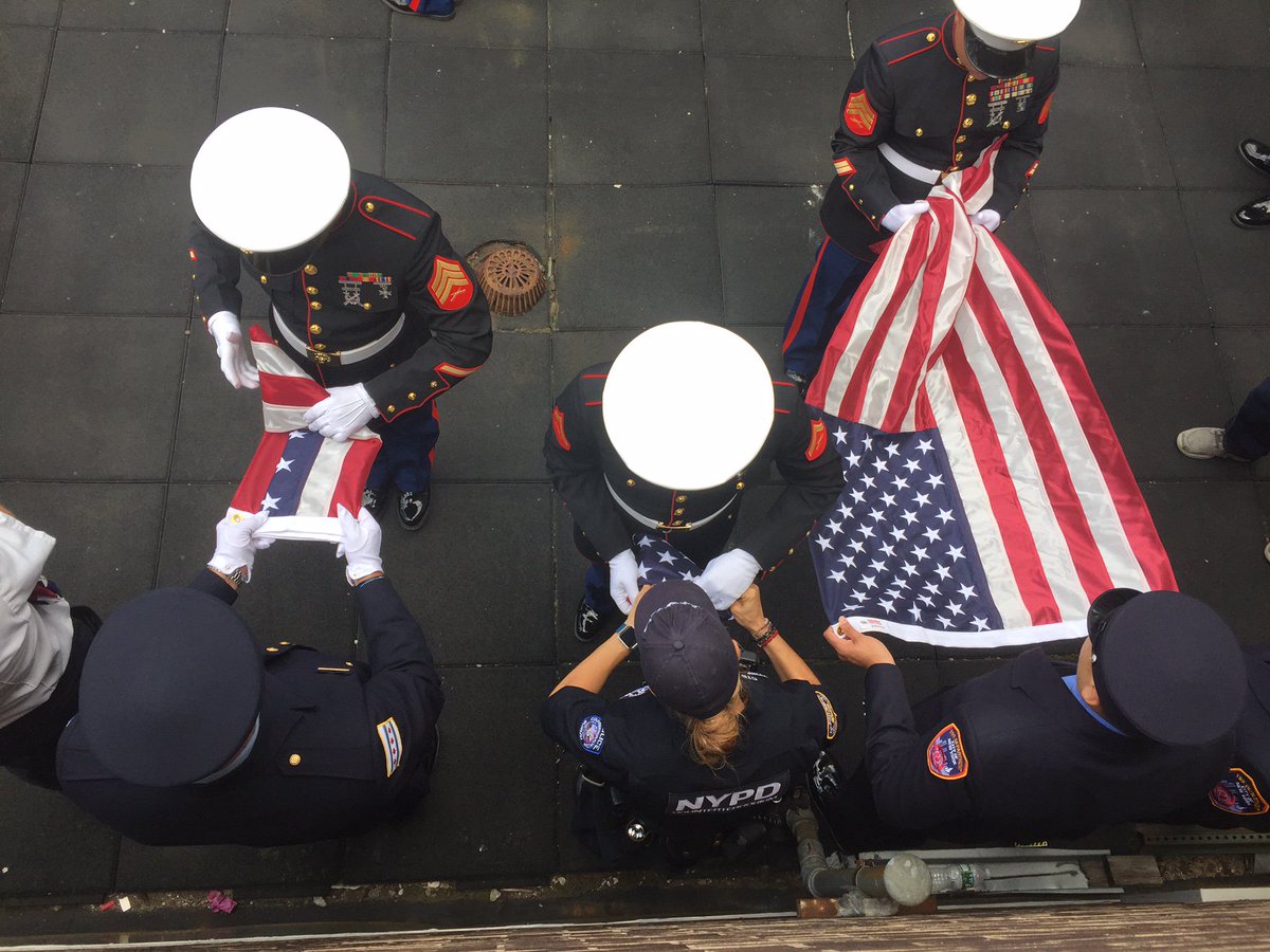 FDNY's tweet image. US Armed Forces members raise the American flag with #FDNY &amp;amp; #NYPD members at #Engine10 #Ladder10 #NeverForget