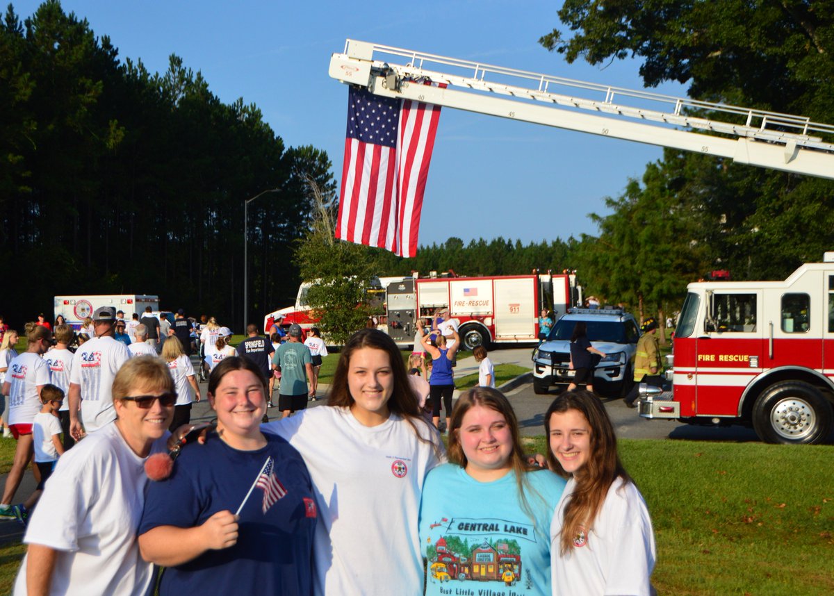 RHHSPhotoClub's tweet photo. RHHS students, faculty and Chief Blalock at Bryan County EMS Walk 2 Remember 343 #WeAreRH https://t.co/R8RDnG0MlN