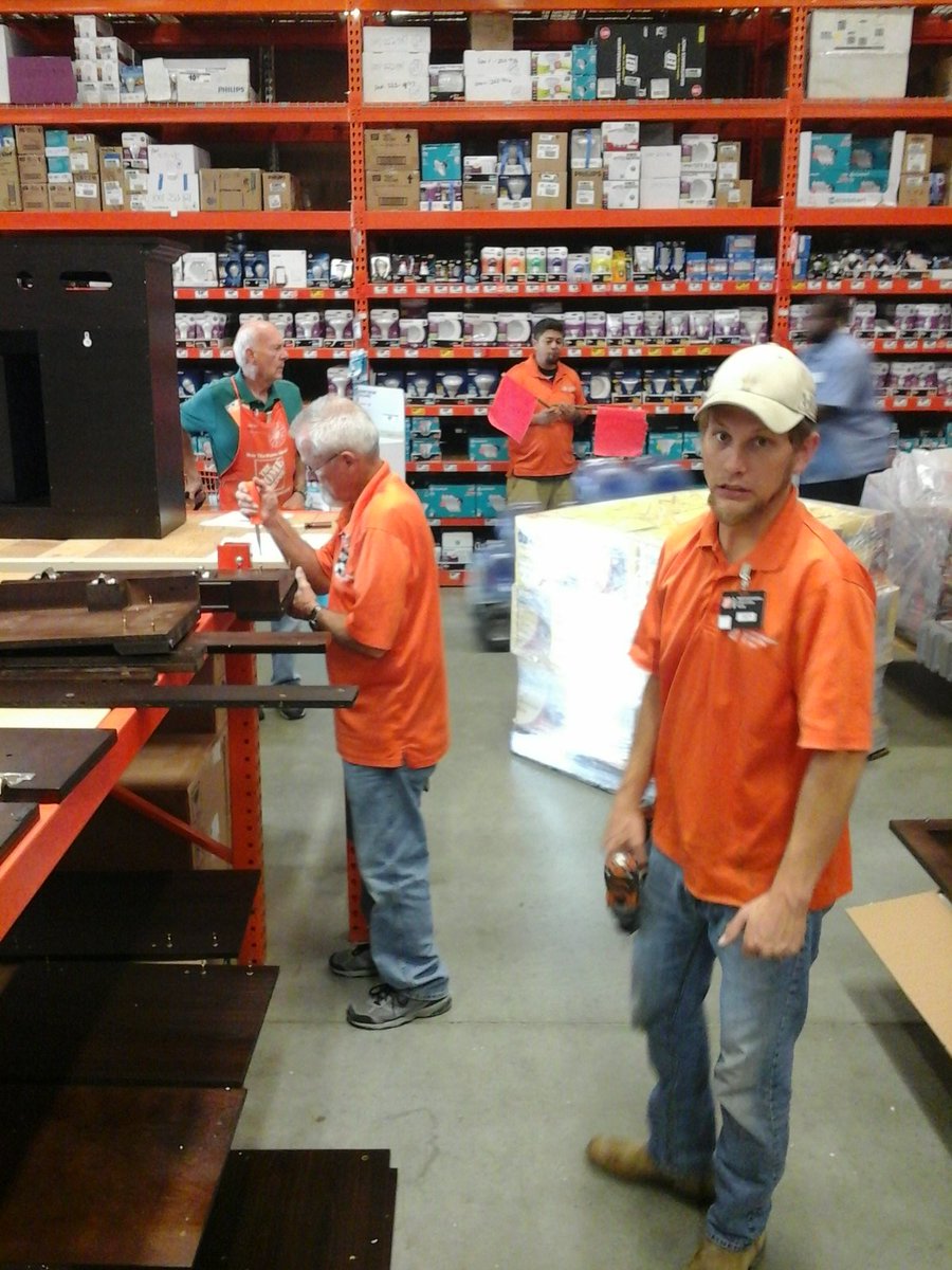 Sam looks thrilled about setting fireplaces! Keep up the great job guys! #auburnrocks #welovefall