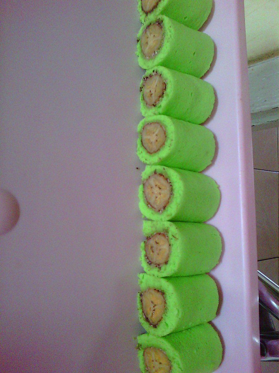 RTongkasi's tweet photo. my handmade banana roll cake #PastryChef #junior #bananarollcake https://t.co/qQyto5QNa9