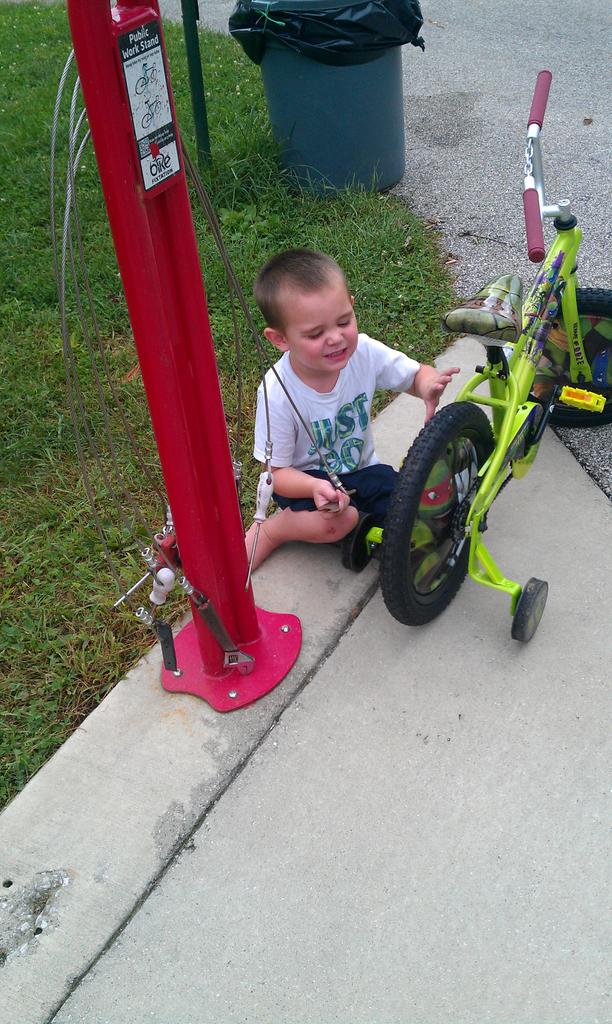 Taking his new bike apart!