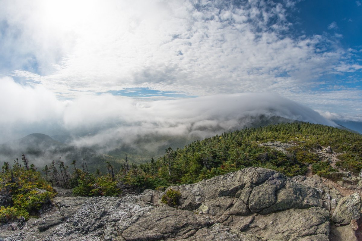 CoolNaturePhoto's tweet photo. Clouds pouring of Carter Dome, one of New Hampshire's tallest peaks https://t.co/sAyMw578nw