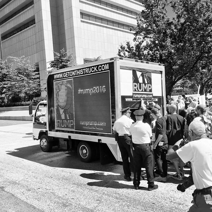 benjancewicz's tweet photo. A #Rump2016 truck rolls up to hand out signs. The police ask him to leave and he goes. #NeverTrump https://t.co/R8fCYZMgOj
