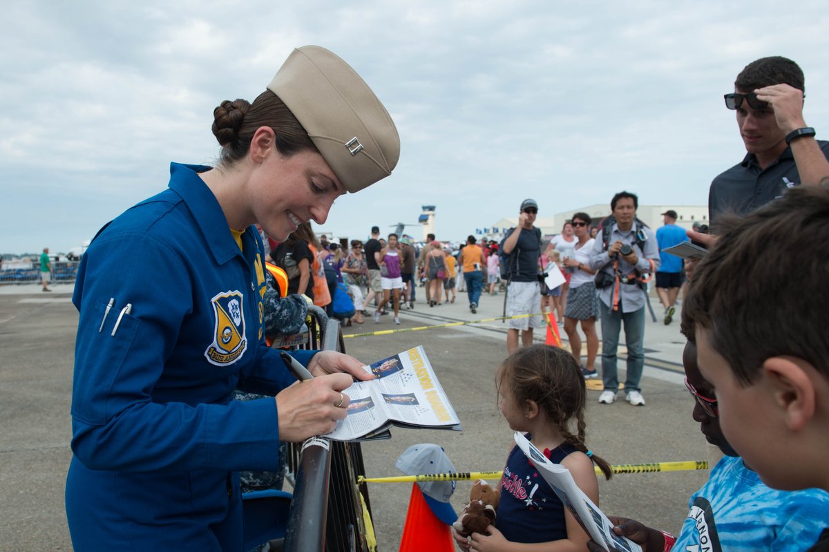 OceanaAirShow's tweet photo. The @BlueAngels greeting #OceanaAirShow patrons and signing their booklets. #NASOceana #USNavy #BlueAngelsFly https://t.co/9JEfGZHJq5