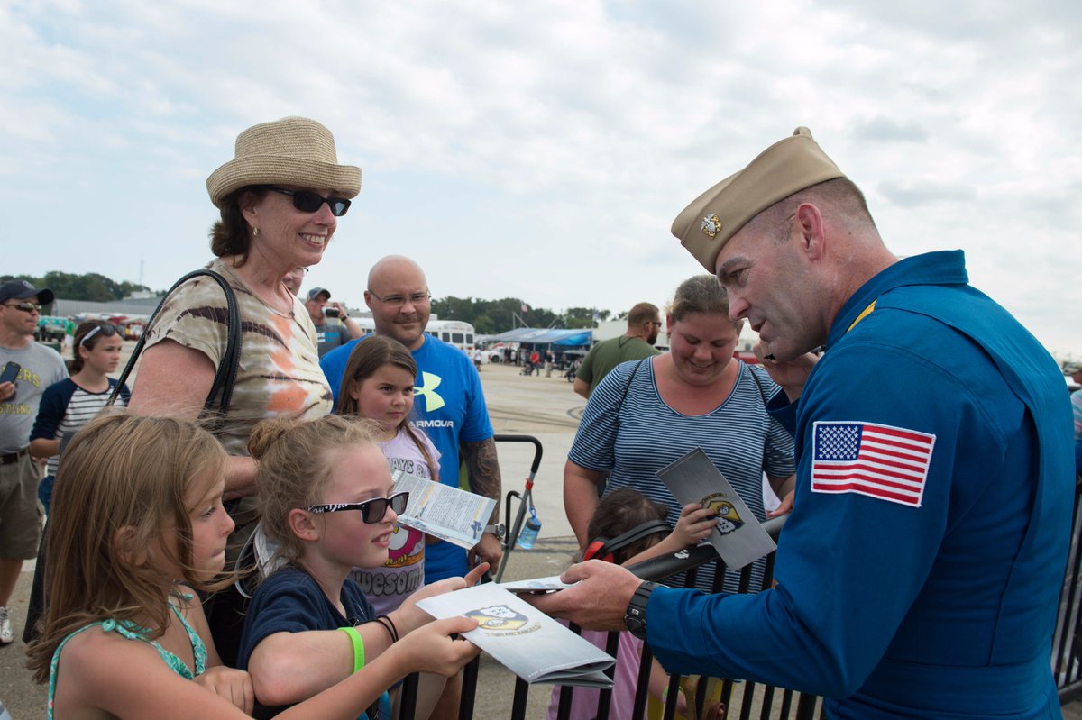 OceanaAirShow's tweet photo. The @BlueAngels greeting #OceanaAirShow patrons and signing their booklets. #NASOceana #USNavy #BlueAngelsFly https://t.co/9JEfGZHJq5