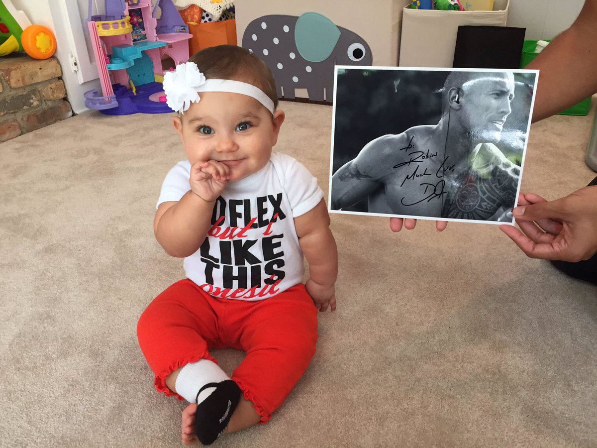 childrensatl's tweet photo. Sheβd flex, but she likes that onesie. Thanks for sending encouragement to this #brachialplexus warrior, @TheRock! https://t.co/fXY9IqsLed