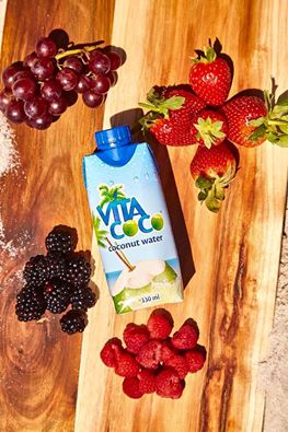 Add some fruit to your coconut water for some added flavour. Yummm!